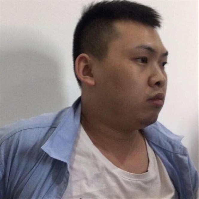 Xiao Qui Ping tại cơ quan công an