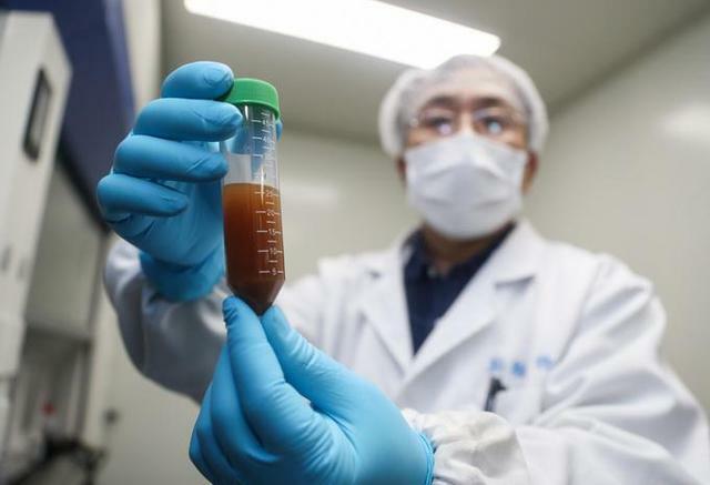 Nhóm nghiên cứu Trung Quốc thử nghiệm vaccine phòng Covid-19 trên động vật. Ảnh: Xinhua.