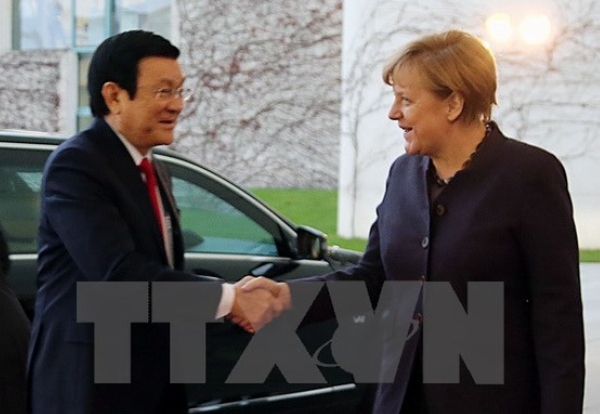 Chủ tịch nước Trương Tấn Sang gặp Thủ tướng Angela Merkel. Ảnh: TTXVN.