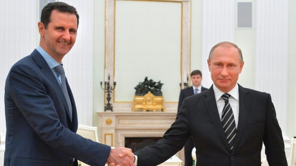 Tổng thống Nga Putin (bên phải) và đồng minh Assad