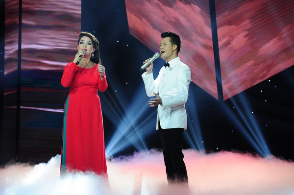 Ở đêm này, Huấn luyện viên Quang Dũng cùng sự quay trở lại của thí sinh Minh Thảo đã cùng kết hợp ăn ý với nhau qua nhạc phẩm Tình nhớ của cố nhạc sĩ Trịnh Công Sơn.