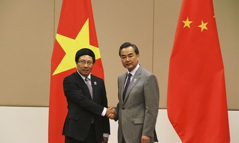 Phó Thủ tướng Phạm Bình Minh và Bộ trưởng Bộ Ngoại giao Trung Quốc Vương Nghị.