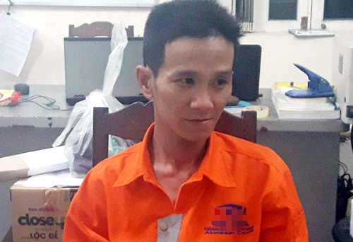 Nghi can Huỳnh Ngọc Phương tại cơ quan điều tra.