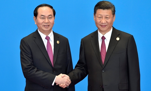 Chủ tịch nước Trần Đại Quang trong cuộc gặp với Chủ tịch Trung Quốc Tập Cận Bình ngày hôm qua. (Ảnh: Reuters)