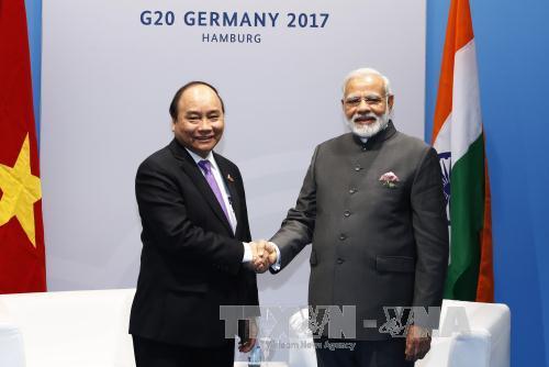 Thủ tướng Nguyễn Xuân Phúc và Thủ tướng Ấn Độ Narendra Modi. - Ảnh: TTXVN