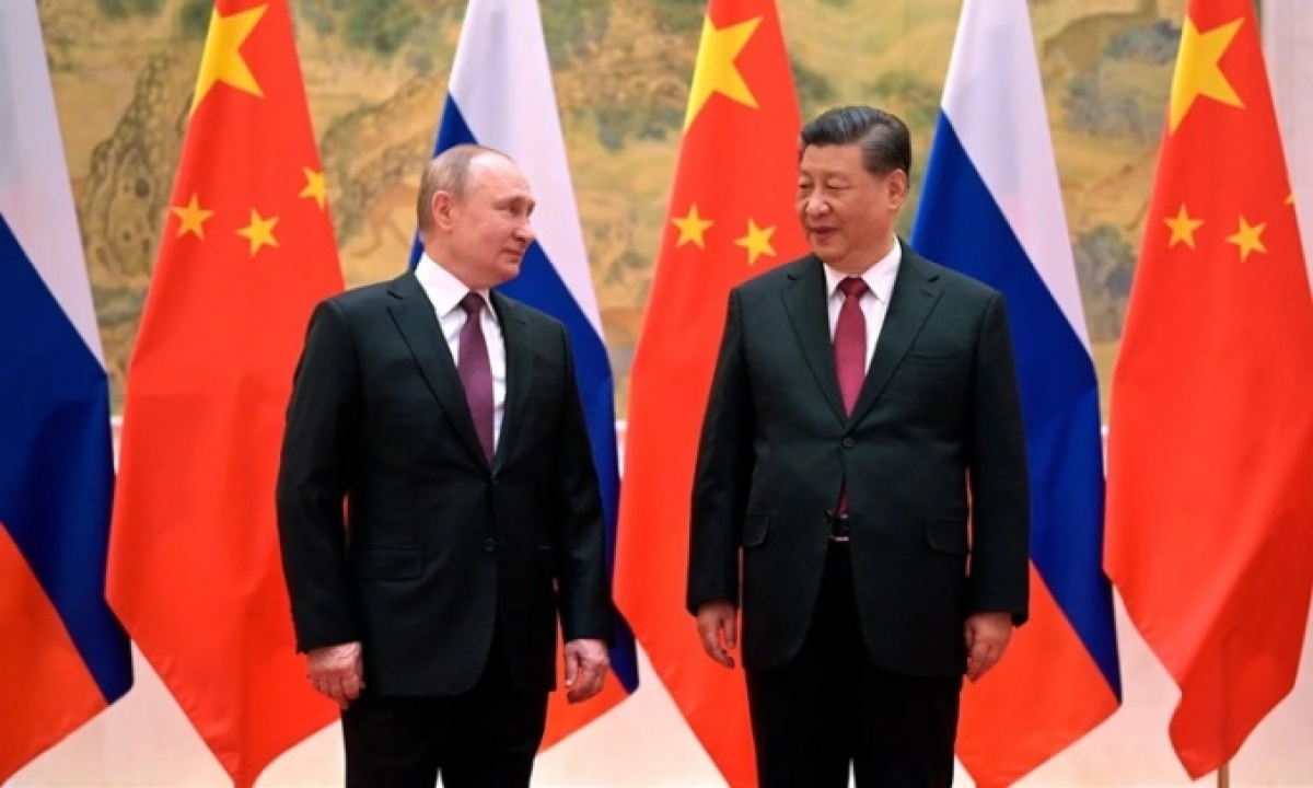 Tổng thống Nga Vladimir Putin (trái) và Chủ tịch Trung Quốc Tập Cận Bình trong một cuộc gặp. Ảnh: NY Times.