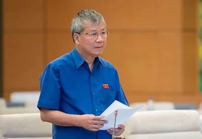 Đại biểu Quốc hội Nguyễn Anh Trí báo cáo tại phiên họp