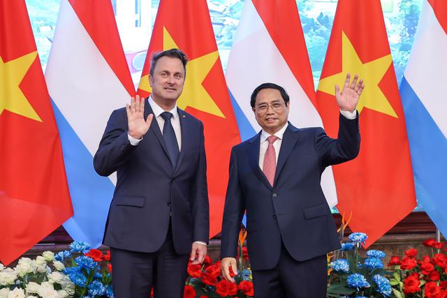 Thủ tướng Chính phủ Phạm Minh Chính và Thủ tướng Xavier Bettel. Ảnh: VGP