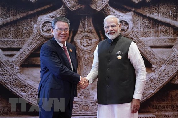 Thủ tướng Ấn Độ Narendra Modi (phải) và Thủ tướng Trung Quốc Lý Cường (trái) tham dự Hội nghị G20 ở New Delhi, Ấn Độ, ngày 9/9/2023. (Ảnh: AFP/TTXVN)