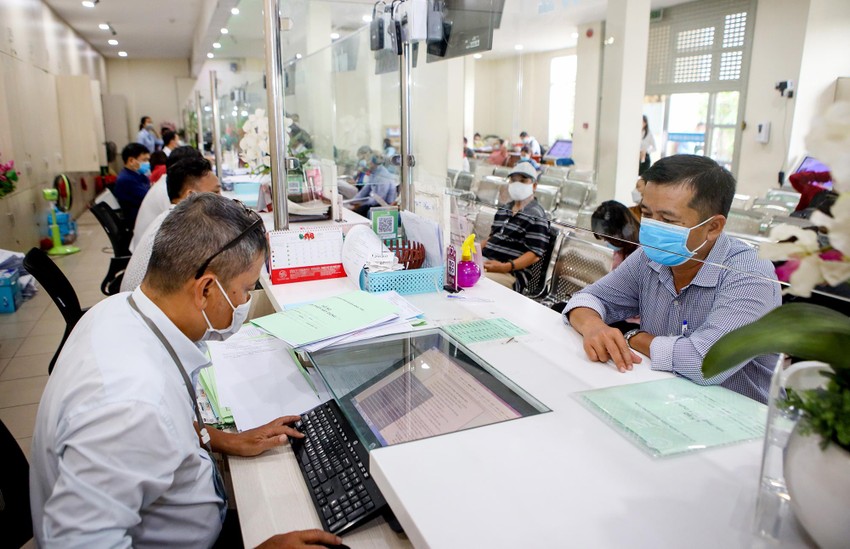 Bộ Nội vụ đề xuất tính biên chế công chức phường theo quy mô dân số ở ba TP lớn. Ảnh minh họa: NGUYỆT NHI