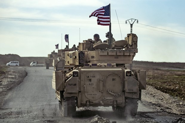 Binh sỹ Mỹ tuần tra tại khu vực cửa khẩu biên giới Semalka giữa Iraq và Syria ngày 12/1/2021. (Ảnh: AFP/TTXVN)