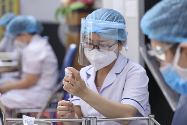 Sẽ tổ chức chiến dịch tiêm chủng vaccine thần tốc mùa Xuân năm 2022. (Ảnh: TTXVN/Vietnam+)