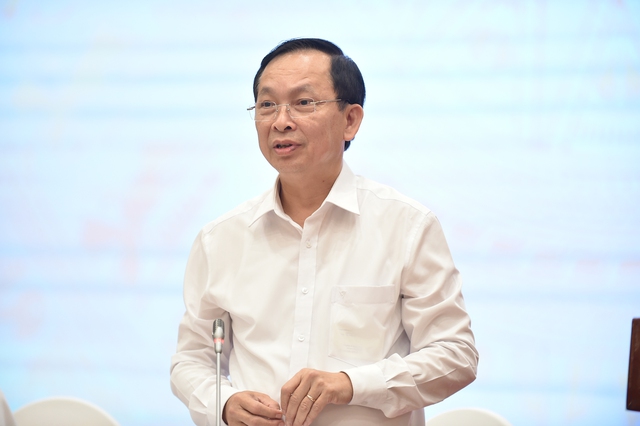 Phó Thống đốc Ngân hàng Nhà nước Việt Nam Đào Minh Tú trả lời báo chí về điều hành tài chính-tiền tệ - Ảnh: VGP