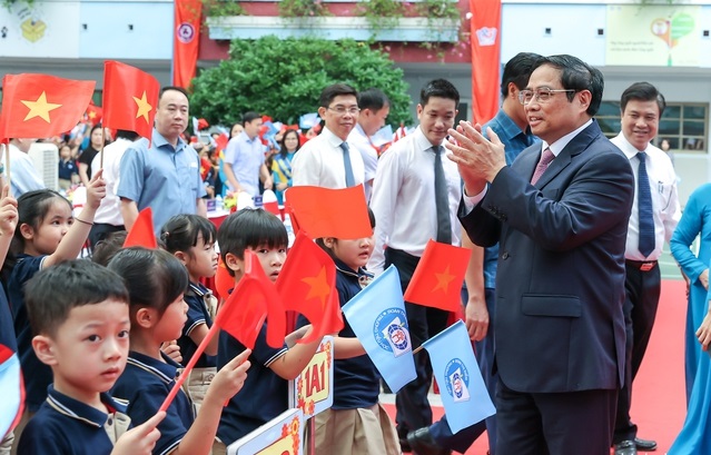Thủ tướng Phạm Minh Chính dự lễ khai giảng năm học mới tại Trường Tiểu học Đoàn Thị Điểm, quận Nam Từ Liêm, Hà Nội - Ảnh: VGP