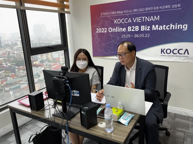 Ông Hong Jeong Yong, Giám đốc KOCCA Việt Nam (phải). (Ảnh: PV/Vietnam+)