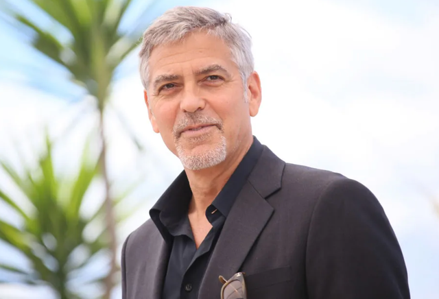Brad Pitt chọn George Clooney là người đàn ông quyến rũ nhất thế giới. (Ảnh: Getty Images)