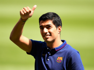 Suarez thề không “cắn người” ở Barca