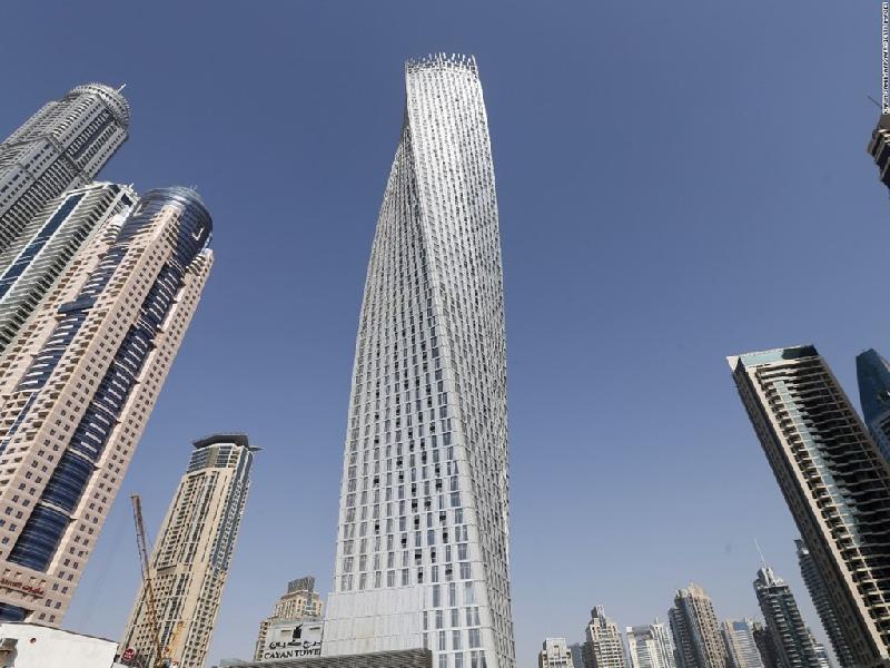 Tháp Cayan cao 306 m nằm ở Dubai, Các Tiểu vương quốc Arab (UAE) là tòa nhà thân xoắn cao thứ 3 thế giới theo Hội đồng Nhà cao tầng và Nhà ở Đô thị (CTBUH). Kiểu thiết kế thân xoắn có thể tạo ra các tòa nhà khí động học và tiết kiệm năng lượng hơn. Ảnh:Getty.
