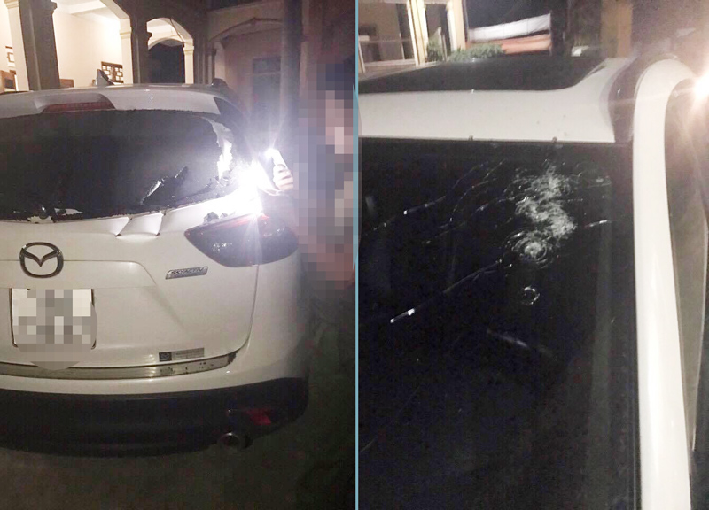 Chiếc xe ô tô Mazda CX5 bị hư hỏng sau vụ tấn công của nhóm côn đồ