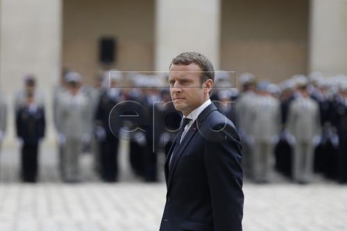 Bắt giam đối tượng đe dọa ám sát Tổng thống Pháp E.Macron. Ảnh minh họa: EPA