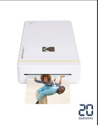 3. Kodak Photo Printer Mini PM-210. Kodak Photo Printer Mini PM-210 là máy in với thiết kế đơn giản, một nút ấn duy nhất và một ứng dụng tiện dụng. Máy in này chỉ hoạt động với Wifi và được trang bị công nghệ in nhiệt cung cấp những bức hình chất lượng tuyệt vời, với màu sắc sống động, rất tự nhiên.